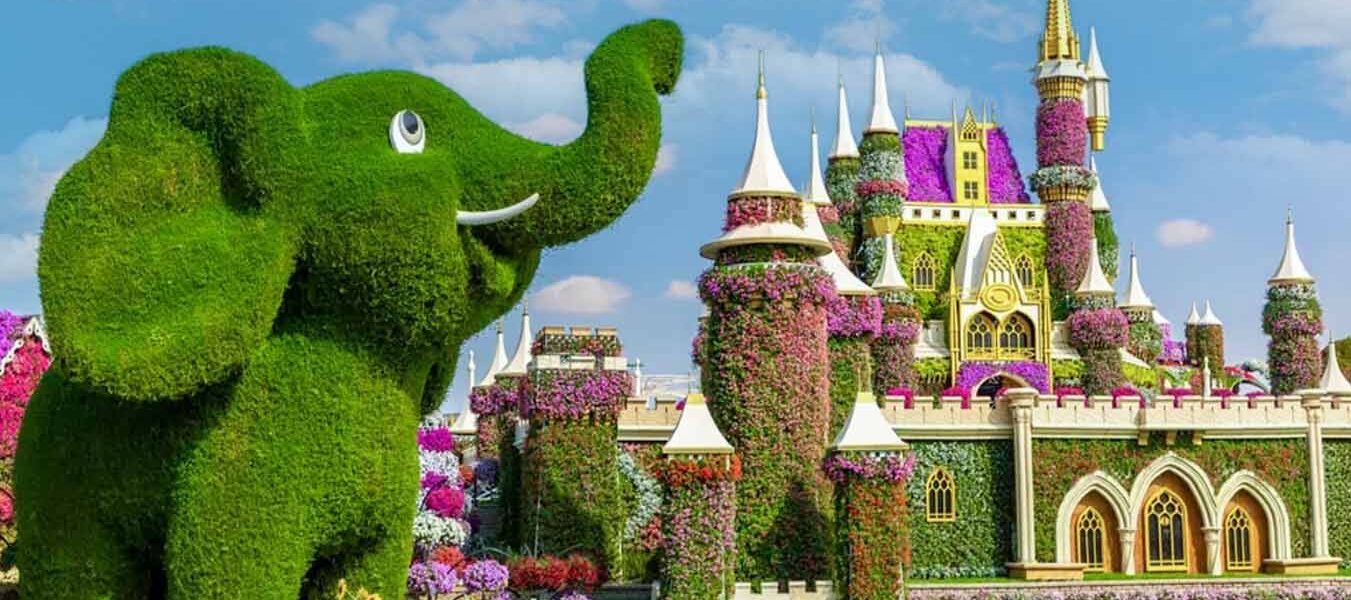 Dubai Miracle Garden 2025 – Must-Visit in Full Bloom! › Forever Tourism LLC A vibrant view of Dubai Miracle Garden with colorful flower structures, showcasing details like Miracle Garden ticket, entry fee, closing date, and working hours.