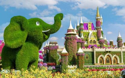 A vibrant view of Dubai Miracle Garden with colorful flower structures, showcasing details like Miracle Garden ticket, entry fee, closing date, and working hours.