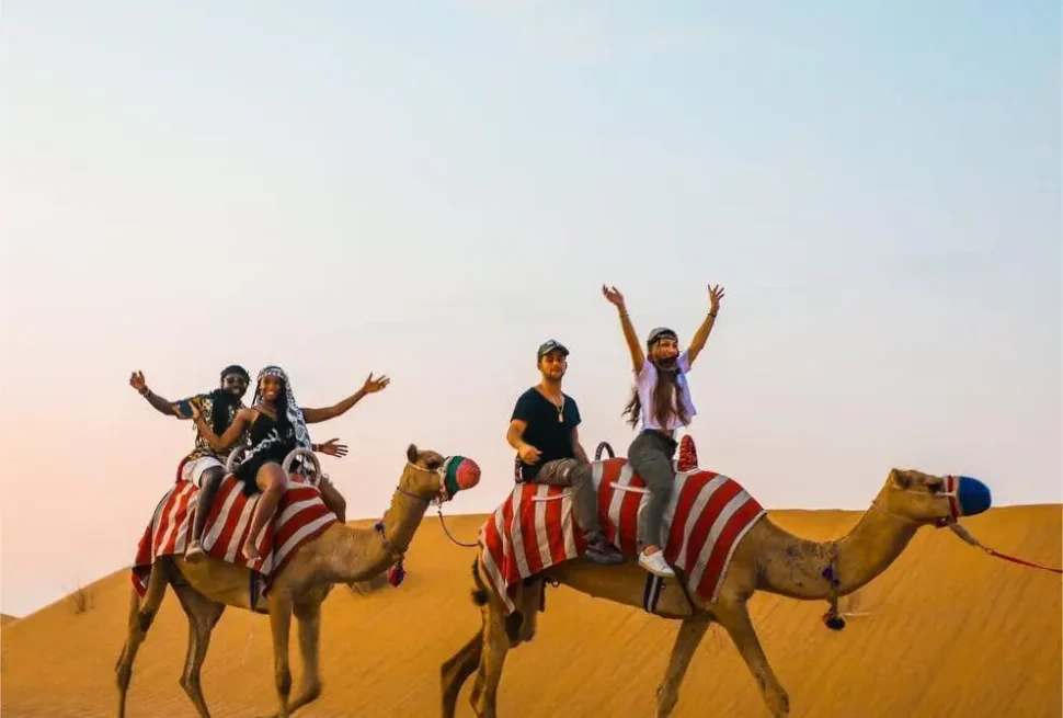 A thrilling quad biking ride through the golden dunes during the best desert safari Dubai, perfect for adventure lovers and an unforgettable family experience.