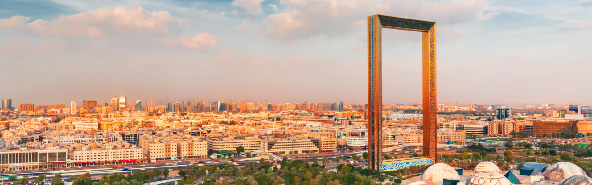 Dubai Frame – March 2025 Views You’ll Want to Capture › Forever Tourism LLC Stunning view of the Dubai Frame during daytime, showcasing its architectural beauty with visitors checking Dubai Frame ticket price and timings.