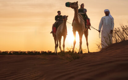 4x4 vehicle driving through sand dunes during a Dubai desert safari – part of the best desert tour Dubai experience.