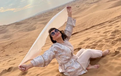Tourists enjoying a thrilling dune buggy ride during a Dubai Desert Safari, showcasing the golden sands and excitement of the best desert safari Dubai tours.