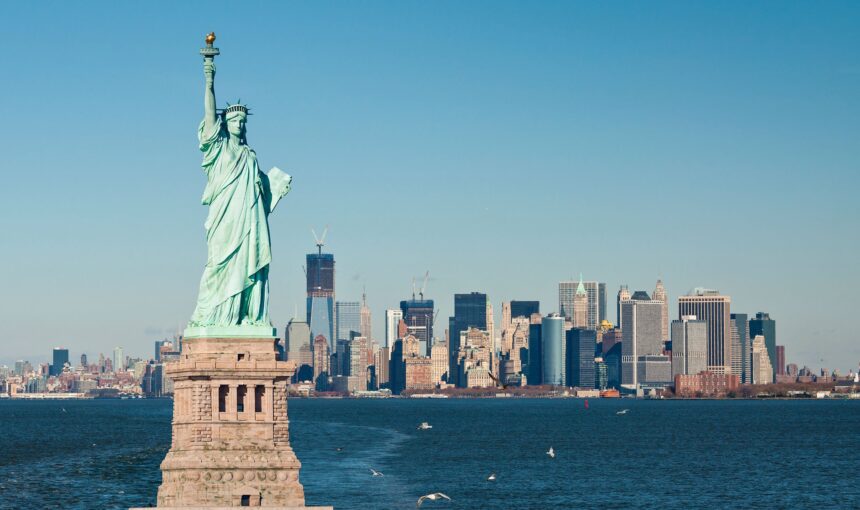 US Tourist Visa From Dubai – Fast Track Entry Tips › Forever Tourism LLC Applicant submitting a US tourist visa from Dubai with completed US visa application documents.