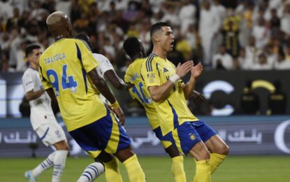 Fans cheering during the intense Al-Hilal vs Al-Nassr match – check lineups and get your Saudi visa to secure tickets for the next big game.