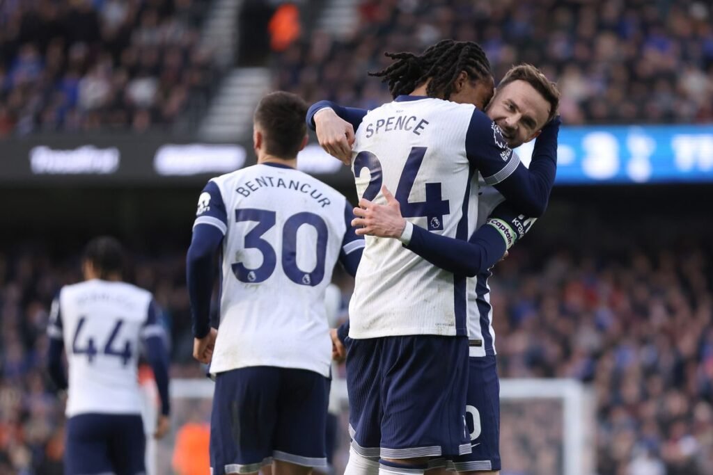 Fans cheering during the Tottenham vs Eintracht Frankfurt match – get your UK visa to witness the next clash live.