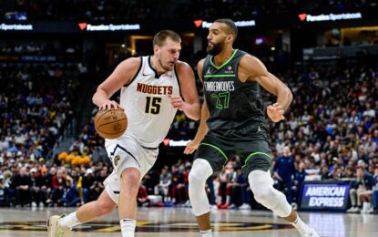 Timberwolves vs Nuggets game action with Denver Nuggets players on the court – witness the thrill live with a USA visa.