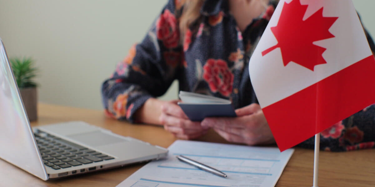 Travel documents and passport for apply for Canada visa from Dubai, showing Canada tourist visa and processing time details.