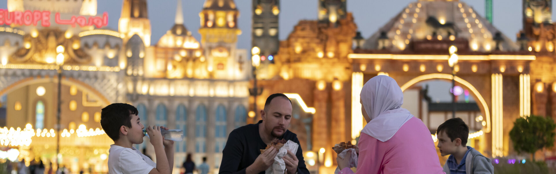 People enjoying cultural attractions with a Global Village entrance ticket for all-day access.