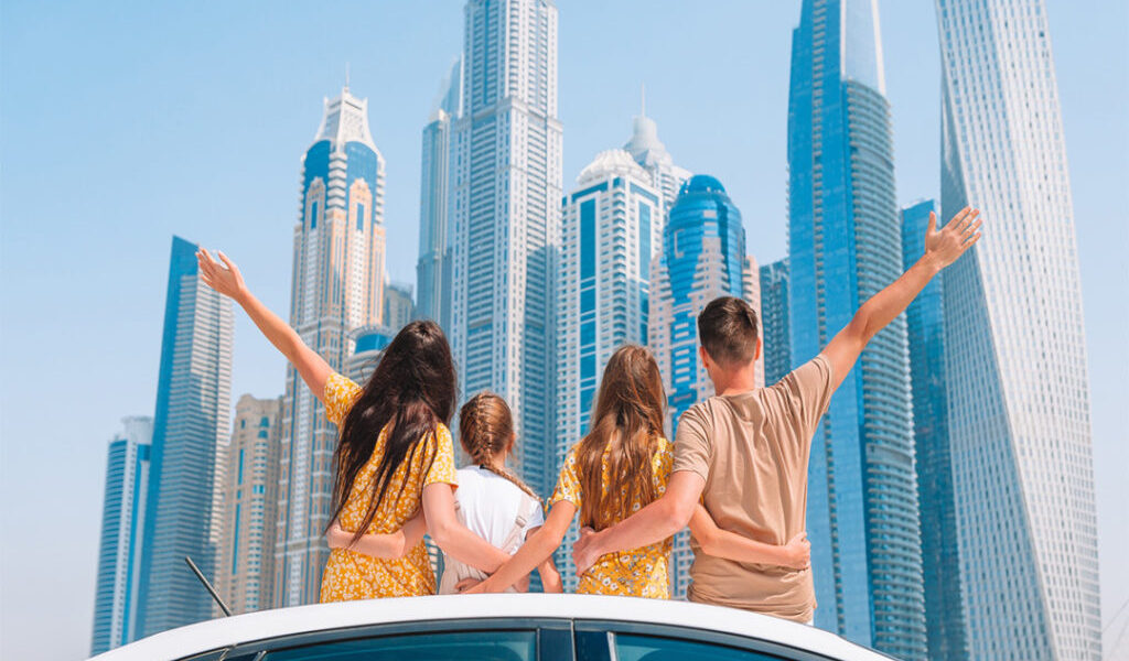 Skyline view of Dubai during a half-day Dubai city tour, featuring iconic landmarks and the towering Burj Khalifa.