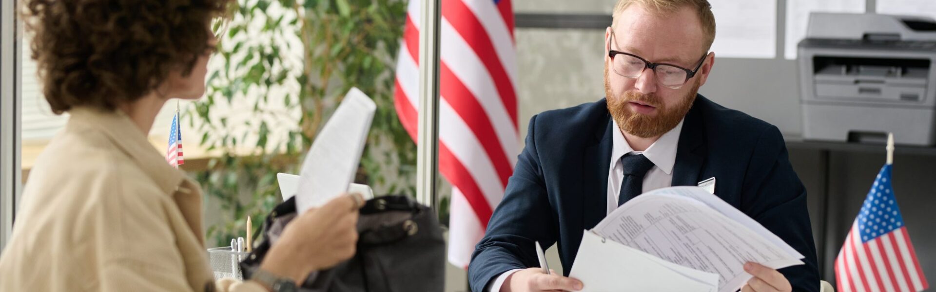 U.S. Visa Application – Skip the Wait With This Hack! › Forever Tourism LLC Passport with U.S. visa and documents showing USA visa info, US visa photo size guide, and tourist visa USA requirements for applicants from Dubai.