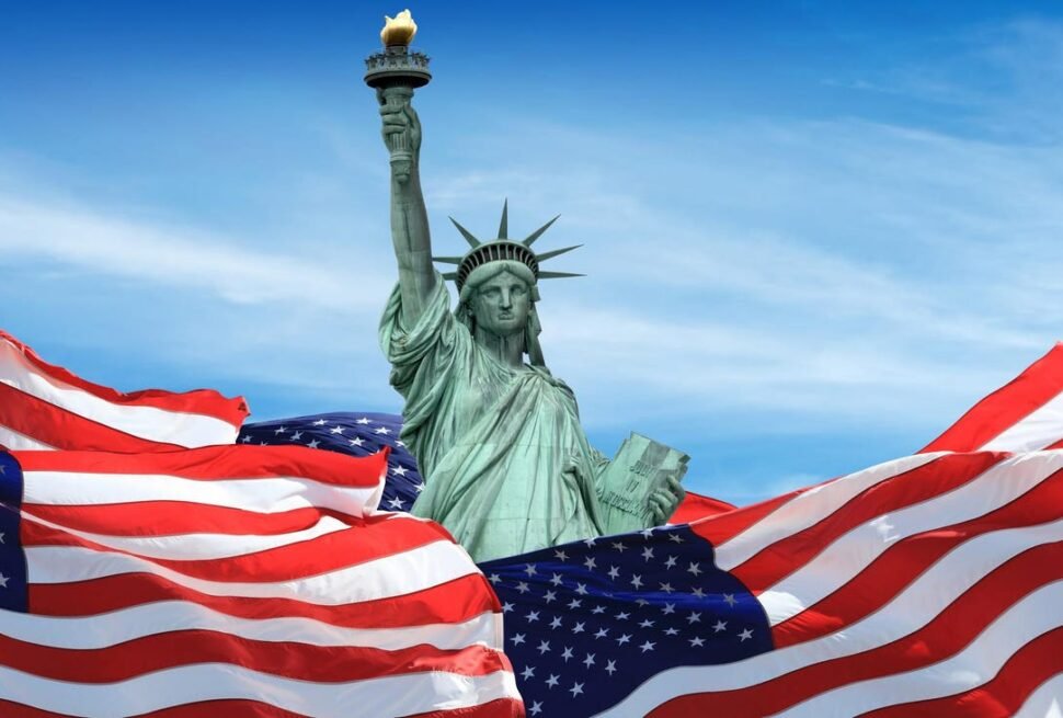 Passport and U.S. visa application form on a desk, representing the process of applying for a US tourist visa from Dubai with USA visa requirements.