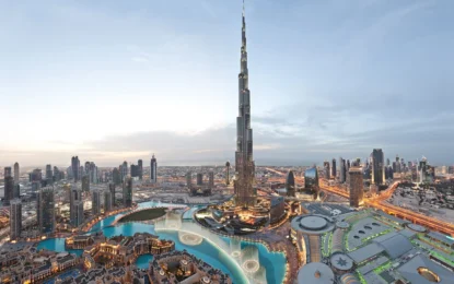 Tourists enjoying a Dubai city tour with views of Burj Khalifa and iconic city landmarks, showcasing popular Dubai city tour packages.