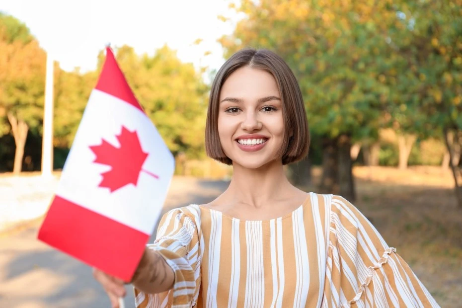 Canada Visa From Dubai – Fastest Route in 2025 › Forever Tourism LLC Traveler reviewing Canada tourist visa application details and processing time from Dubai.