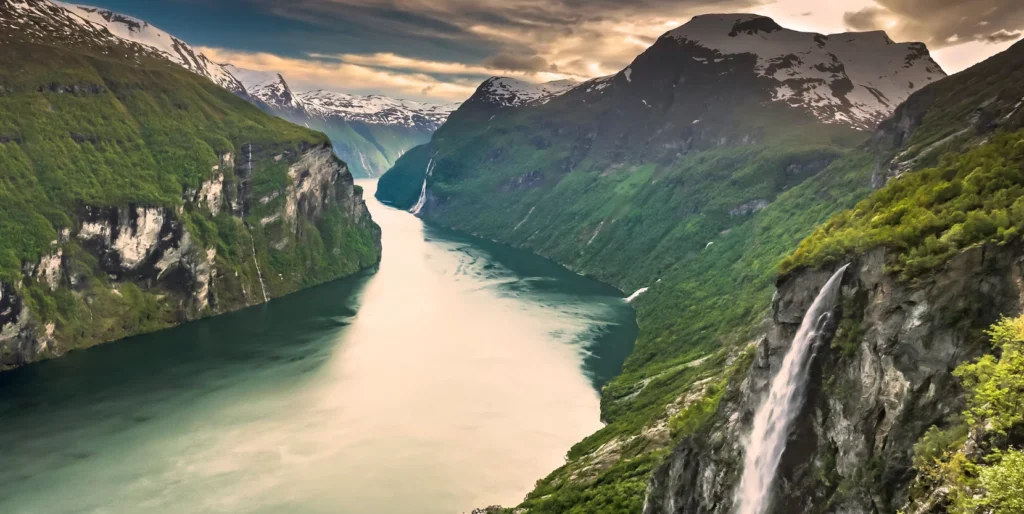 Norway Schengen Visa: Unlock This Dream Trip Now! › Forever Tourism LLC Passport with Norway Schengen visa stamp, ready for travel across Schengen countries.