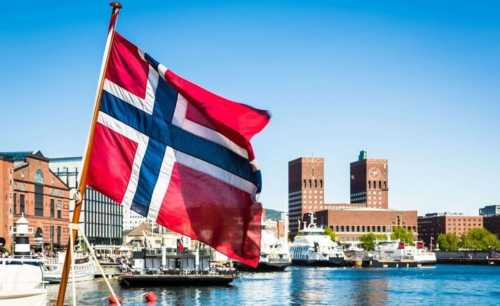Norway Schengen Visa: Unlock This Dream Trip Now! › Forever Tourism LLC Passport with Norway Schengen visa stamp, ready for travel across Schengen countries.