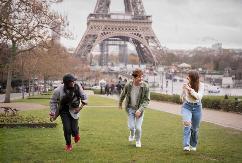 Traveler holding passport with France Schengen visa, ready to explore Schengen visa countries including France – ideal for applicants from Dubai and beyond.