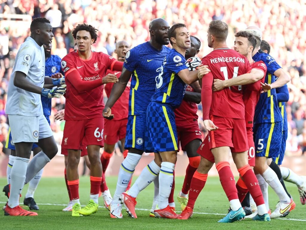 Chelsea vs Liverpool – Missed the thriller? Be ready for next! › Forever Tourism LLC Fans cheering during the Chelsea vs Liverpool match – plan your trip and get a UK visa to witness Chelsea and Liverpool live next time.