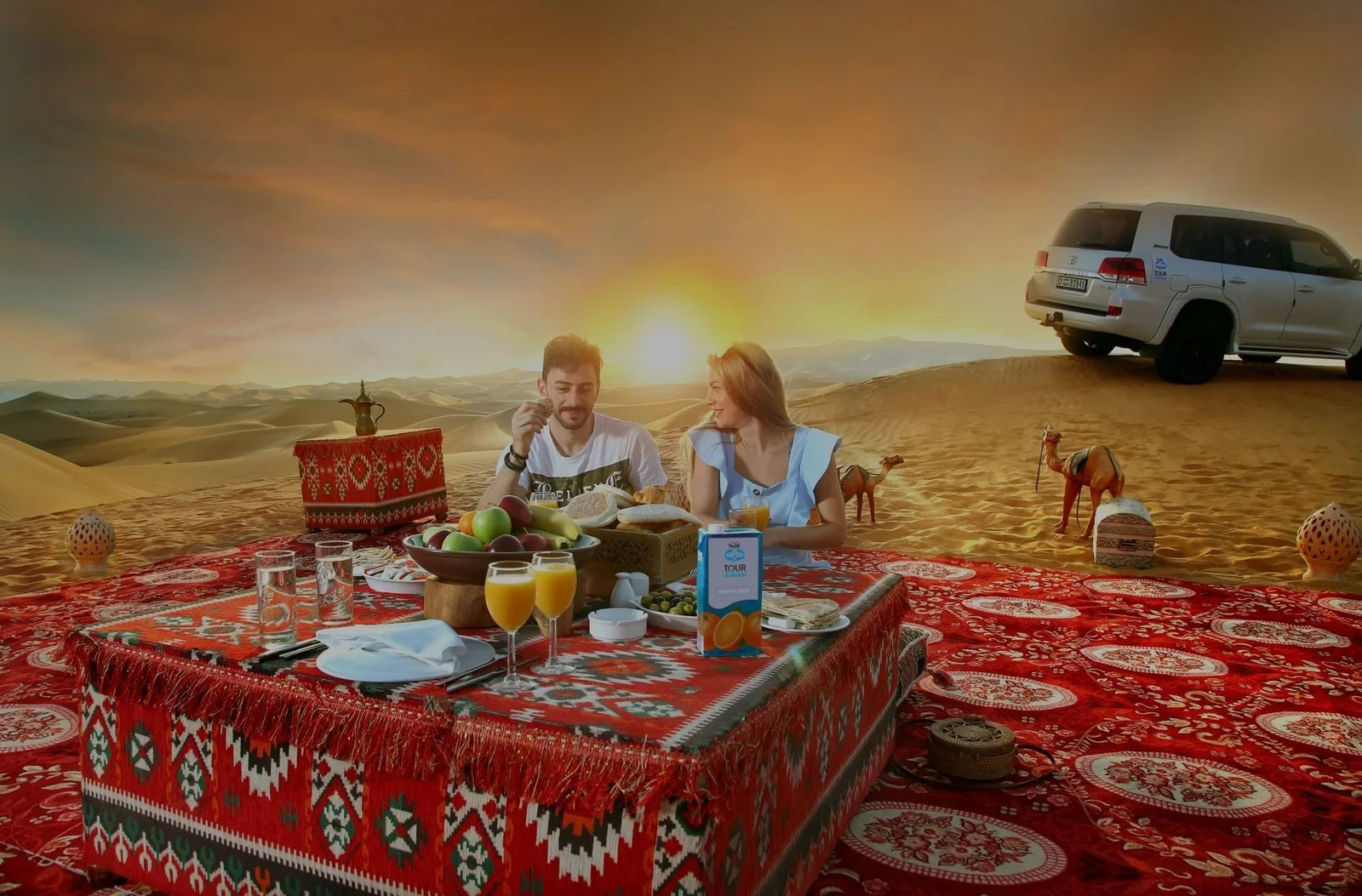 Tourists enjoying a morning desert safari Dubai adventure with dune bashing and camel rides, showcasing the best desert safari in Dubai deals.