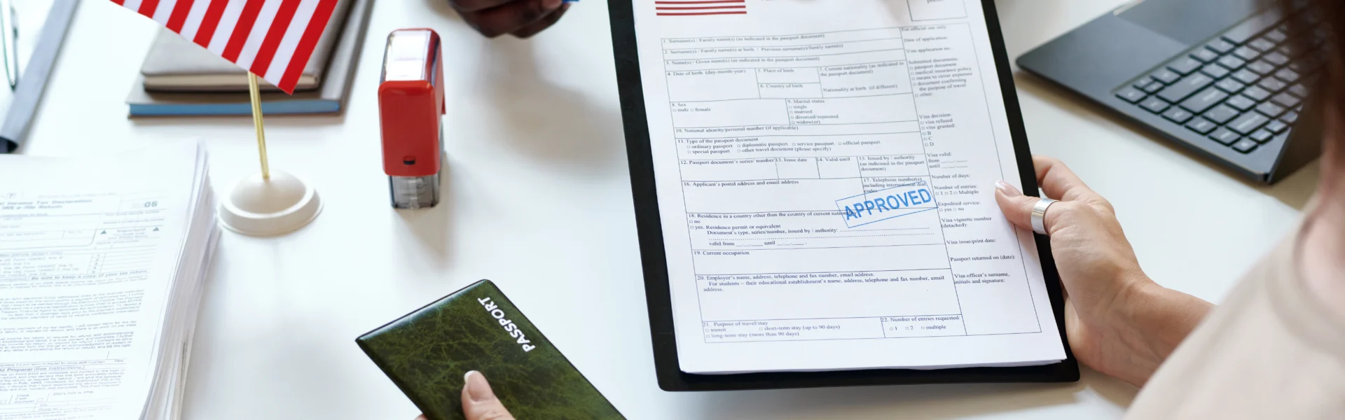 Traveler in Dubai preparing documents for USA visa from Dubai, showing the steps for US visa application and booking a US visa appointment in Dubai.