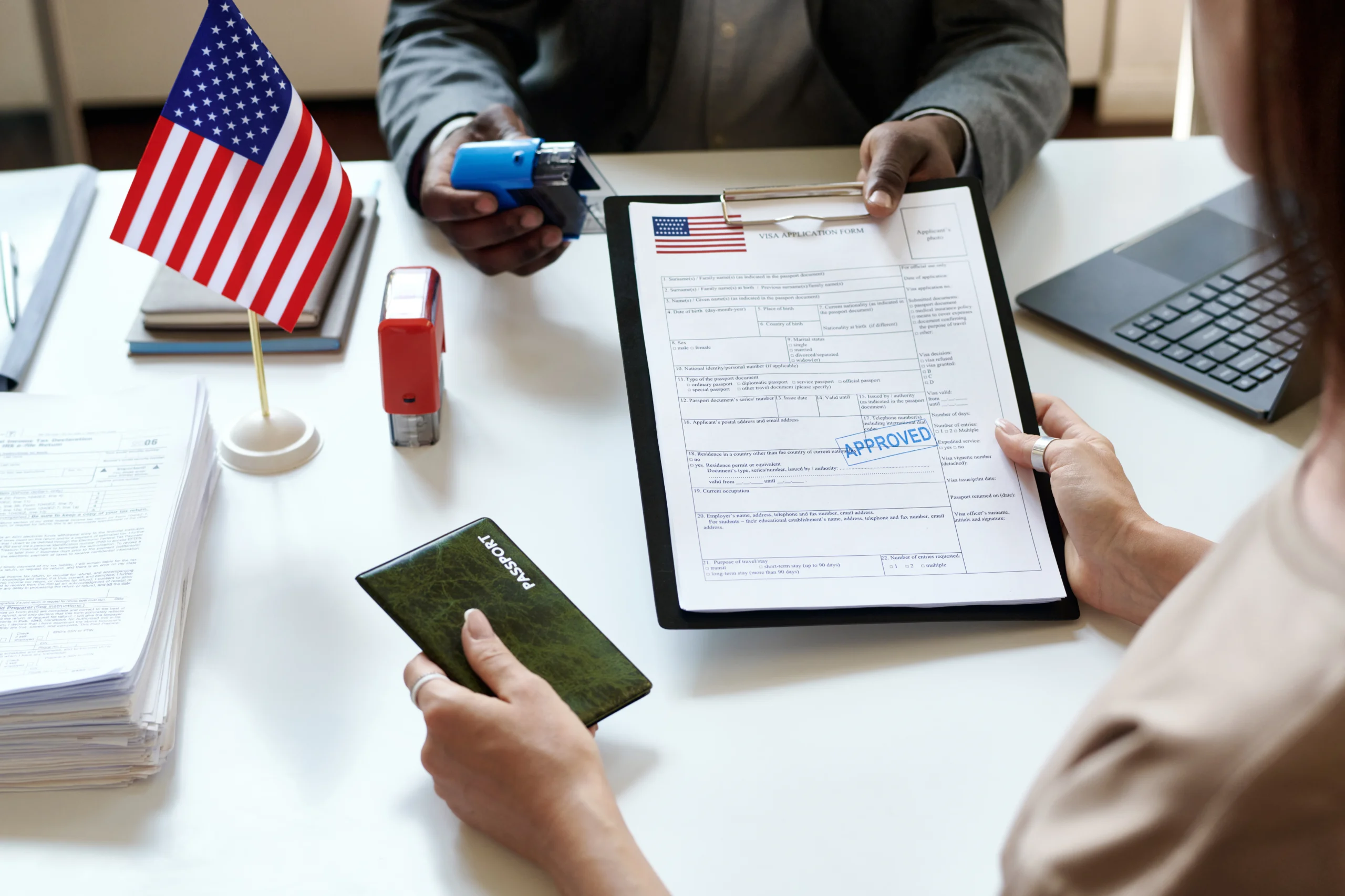 Traveler in Dubai preparing documents for USA visa from Dubai, showing the steps for US visa application and booking a US visa appointment in Dubai.