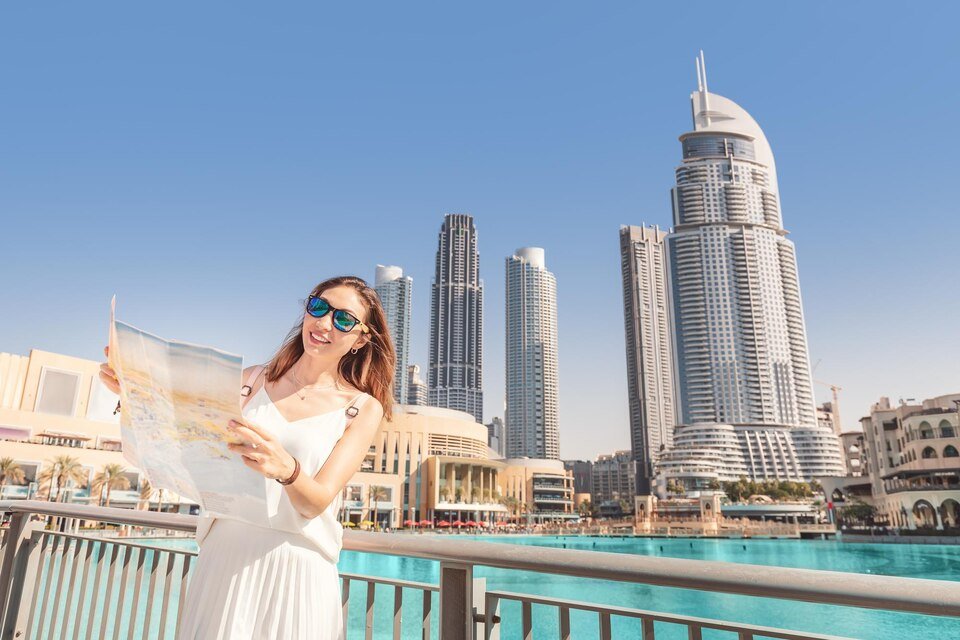 Panoramic view of Dubai skyline featuring the Burj Khalifa, highlighting Dubai City Tour Package with Desert Safari and Burj Khalifa Tickets.