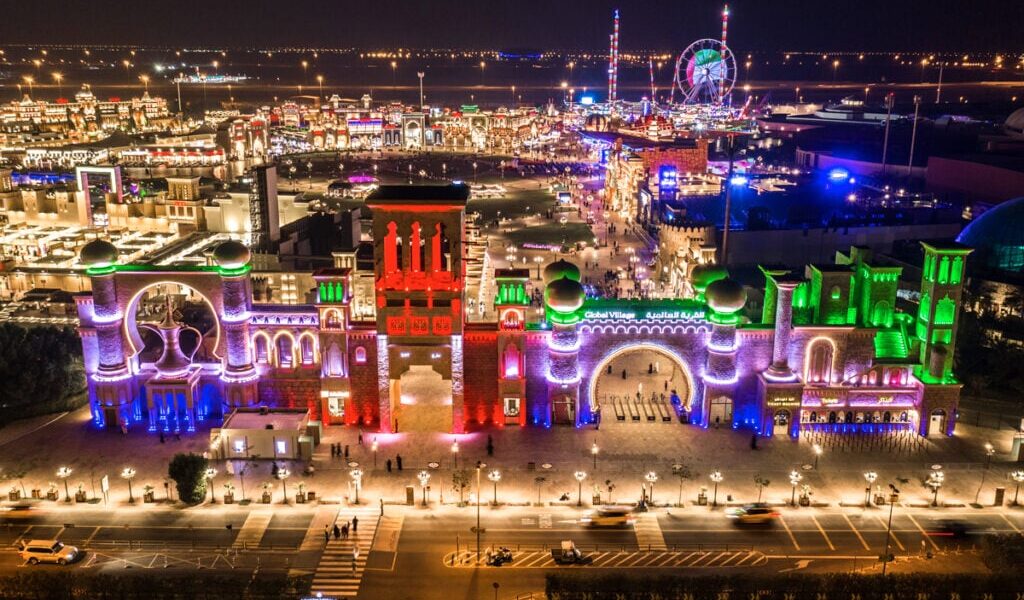 Visitors enjoying the vibrant pavilions and live entertainment at Global Village Dubai on the last day of Global Village 2025 with Global Village tickets from Forever Tourism.