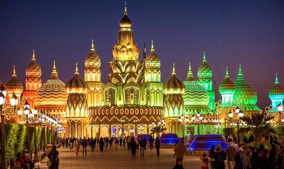 Crowds enjoying cultural shows and attractions at Global Village Dubai 2025 before the closing date, with festive lights and vibrant market stalls.