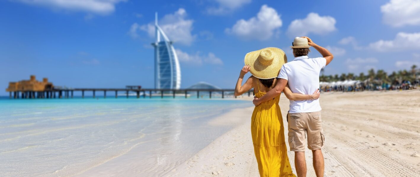 Family enjoying summer vacation with a Dubai skyline backdrop – promoting a 4N/5D holiday package in Dubai at ₹29,449, ideal for Dubai Eid holiday package.