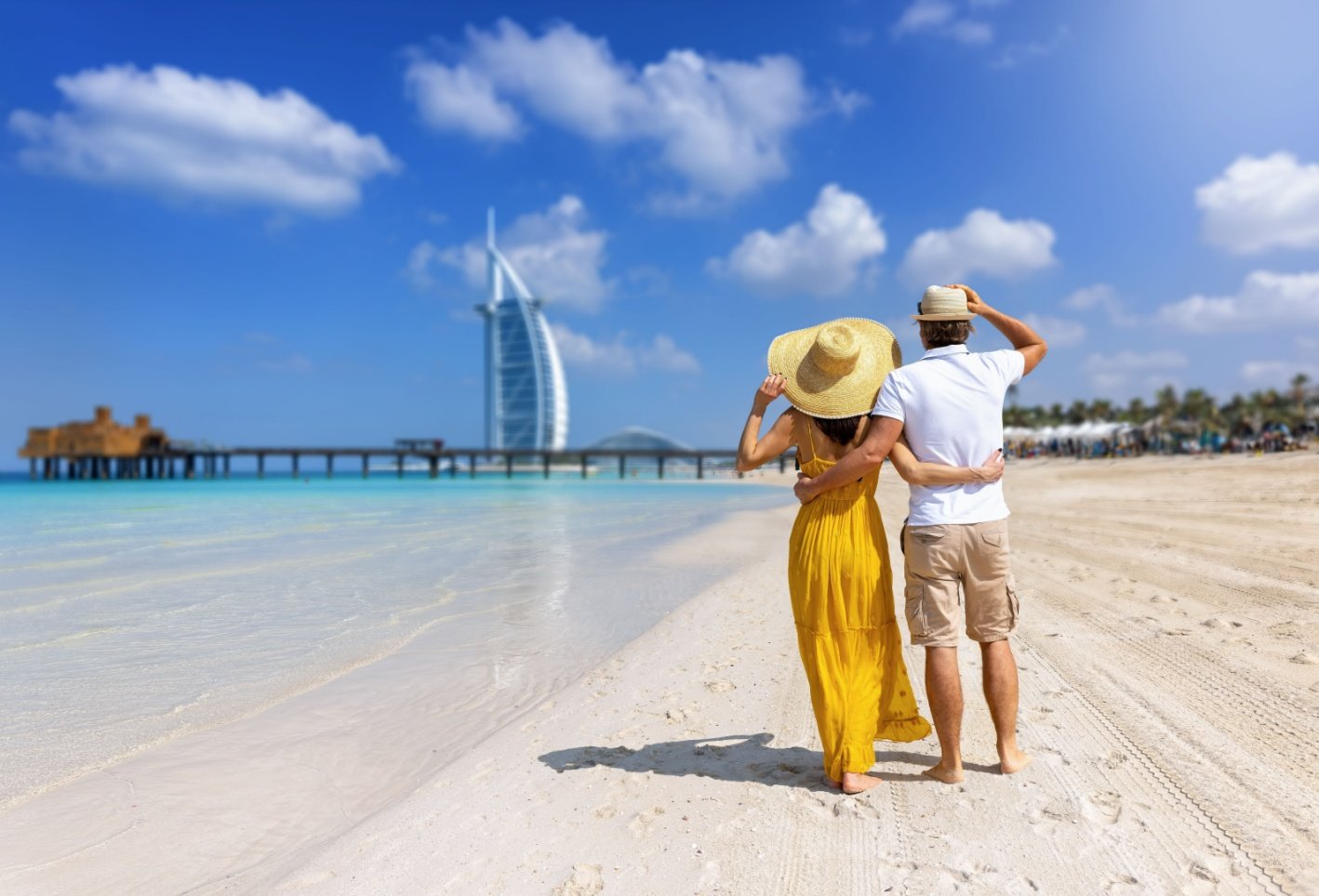 Family enjoying summer vacation with a Dubai skyline backdrop – promoting a 4N/5D holiday package in Dubai at ₹29,449, ideal for Dubai Eid holiday package.