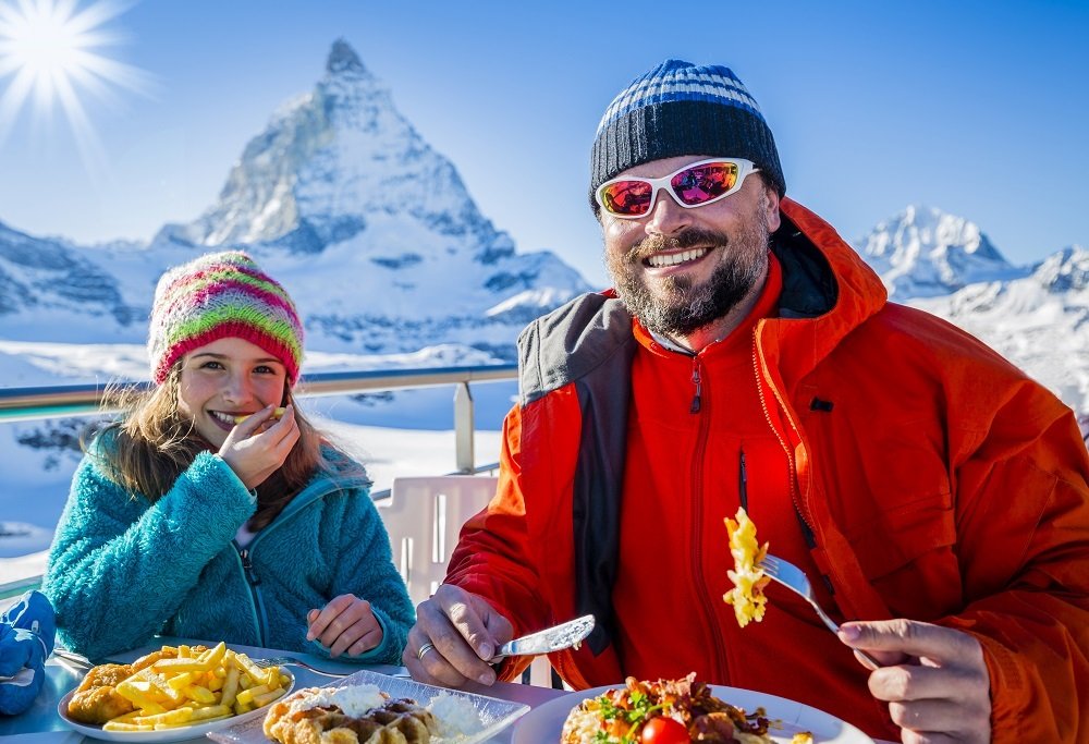 Switzerland Schengen Visa Secrets Revealed! #TopTips › Forever Tourism LLC A traveler in Dubai filling out a Schengen visa application form for entry to Switzerland, showcasing access to Schengen countries and connection with Swiss people.