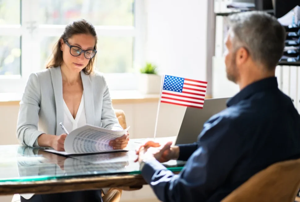 Person filling out a US visa application from Dubai for a US tourist visa.