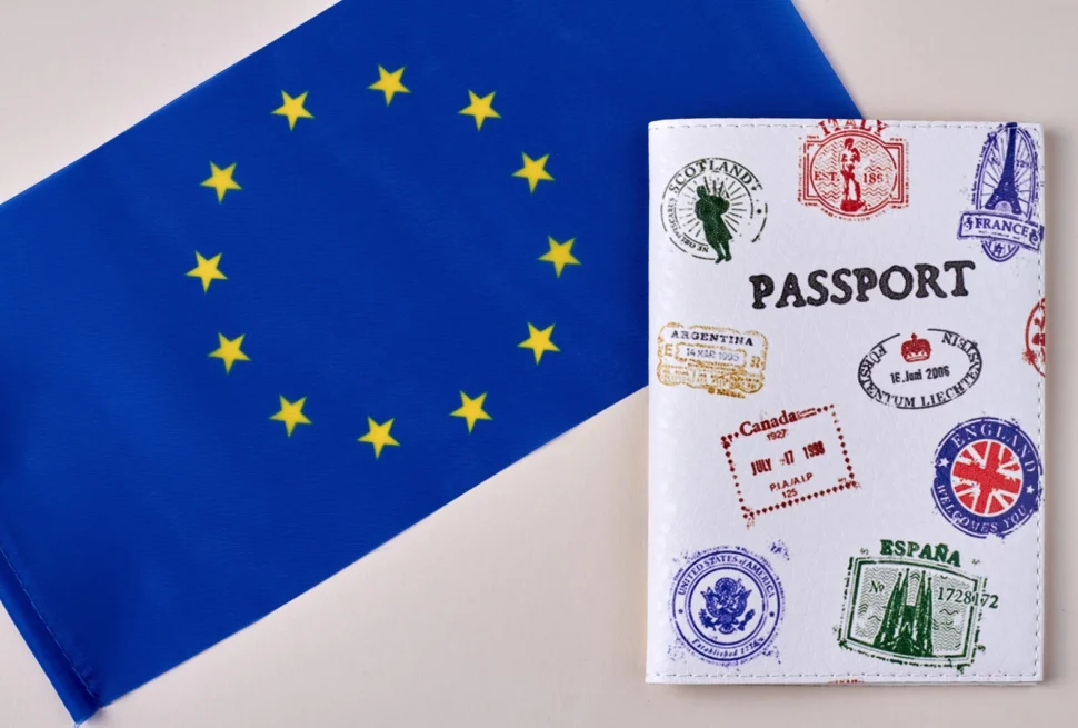 Passport with visa stamps representing Schengen visa from UAE, Schengen visa appointment, and list of Schengen countries.