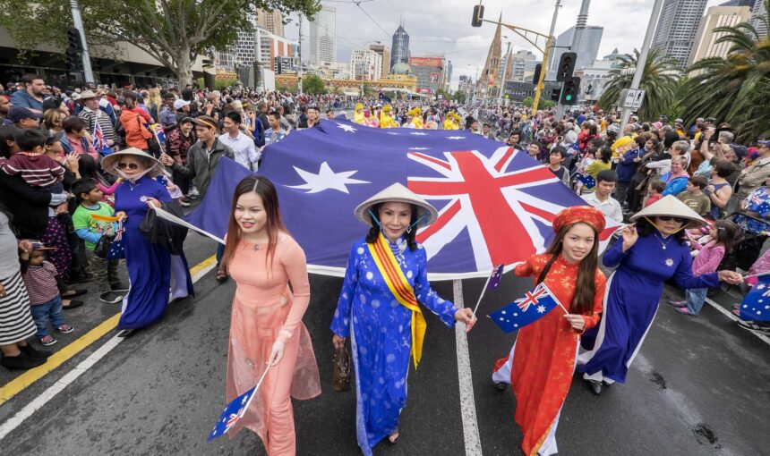 Passport with Australia visa stamp and travel documents showing steps on how to apply for australia tourist visa from dubai for a hassle-free Australia tourist visa process.