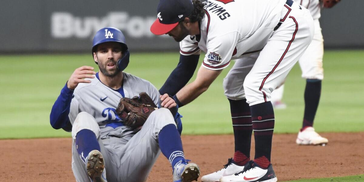 Fans cheering during the intense Dodgers vs Braves game between the Atlanta Braves and Los Angeles Dodgers.