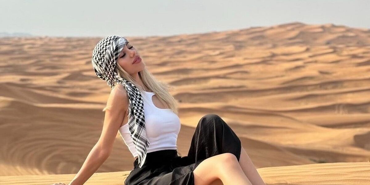 Tourists enjoying dune bashing during a morning desert safari in Dubai – an exciting Desert Safari in Dubai experience.