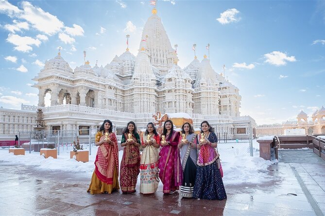 City Tour Abu Dhabi: Ferrari World Deal Inside! › Forever Tourism LLC Skyline view of Abu Dhabi with highlights from the City Tour Abu Dhabi, including Ferrari World and the BAPS Hindu Mandir.
