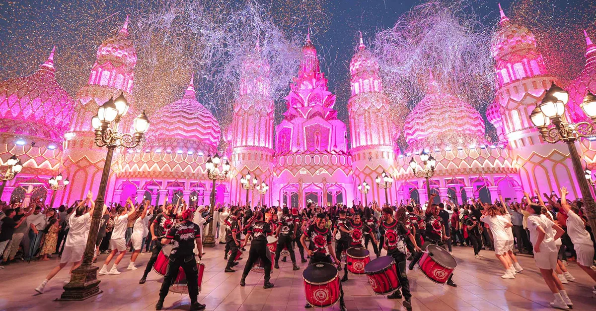 Crowds enjoying cultural shows and shopping at Global Village Dubai 2025, with updated information on closing date and working hours.