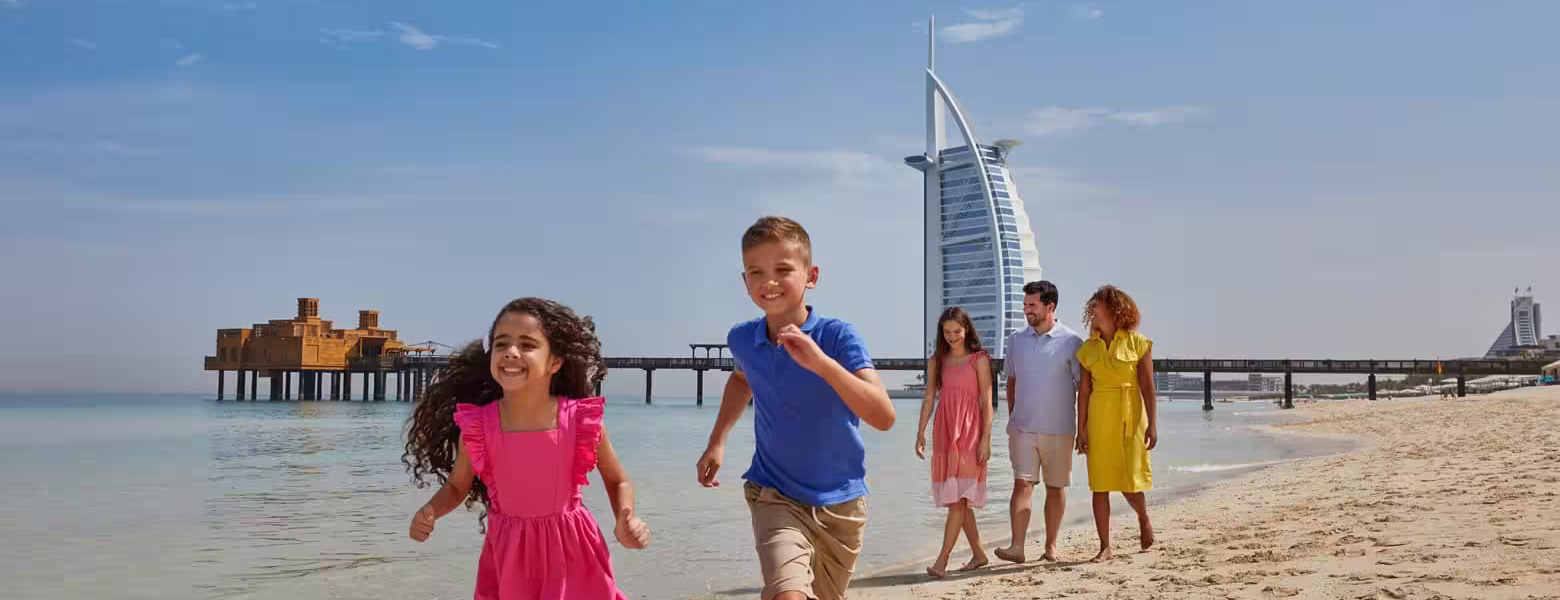 Family enjoying Dubai holiday packages during Eid Al Adha 2025 with a scenic city backdrop, perfect for June Eid holidays and festive travel in Dubai.