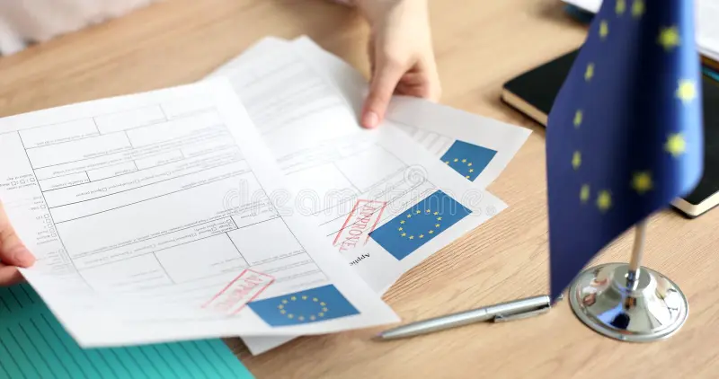Schengen Visa – Easiest Way to Apply in 2025 › Forever Tourism LLC Traveler reviewing Schengen visa requirements from Dubai, with a map showing the Schengen visa country list and details on visa validity.