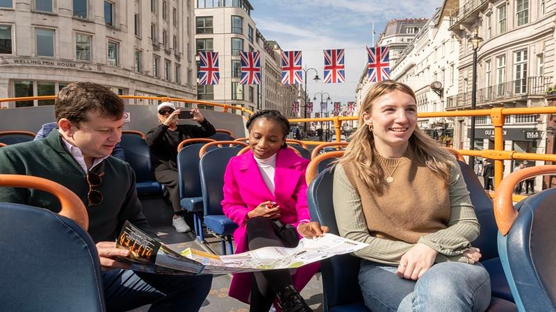 UK Visa for UAE Residents – Top Hacks for Fast Entry › Forever Tourism LLC Illustration showing UK visa for UAE residents with travel documents, highlighting United Kingdom visa requirements and tourist visa processing time.