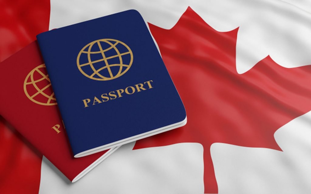 Documents and photo showing Canada visa photo size and requirements for Canada tourist visa from Dubai.