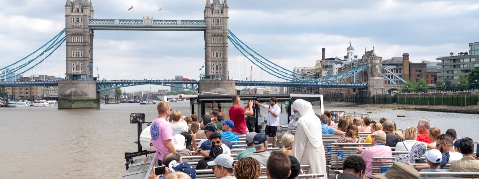 UK Visa for UAE Residents – Top Hacks for Fast Entry › Forever Tourism LLC Illustration showing UK visa for UAE residents with travel documents, highlighting United Kingdom visa requirements and tourist visa processing time.