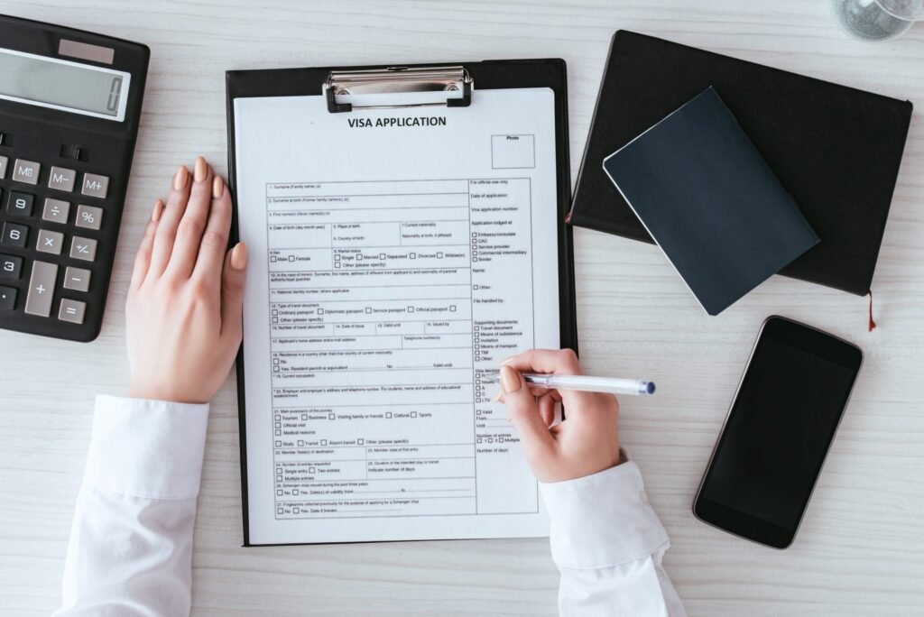 Tourist Visa USA Requirements You Must Know! #Top5 › Forever Tourism LLC Traveler reviewing tourist visa USA requirements and preparing for a US visa appointment from Dubai.