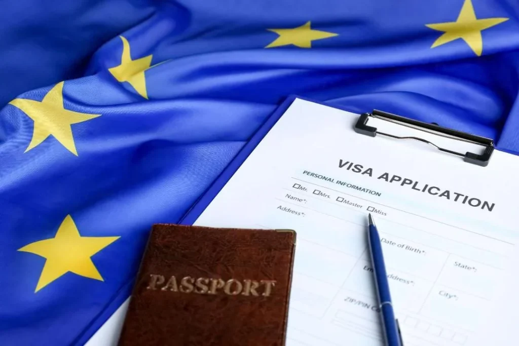 Schengen Spain Visa: What You Need to Know Now! › Forever Tourism LLC Travel documents and passport for Schengen Spain visa application from Dubai or UAE, offering access to Spain and the Schengen zone.