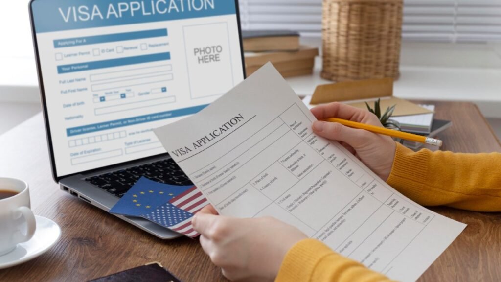 Person filling out a US visa application from Dubai for a US tourist visa.