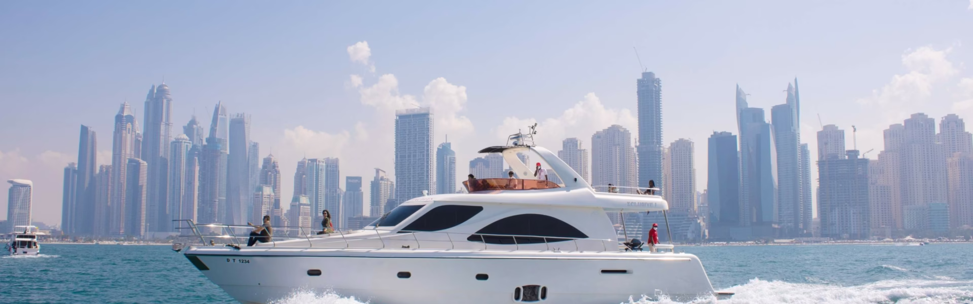 Luxury yacht sailing in Dubai Marina during sunset – best yacht rental Dubai for a premium yacht trip experience.