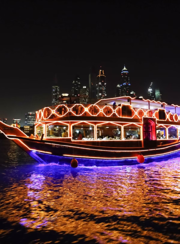 Traditional boat on a dhow cruise marina with dinner, showcasing waterfront views, elegant dining, and serene evening ambiance.