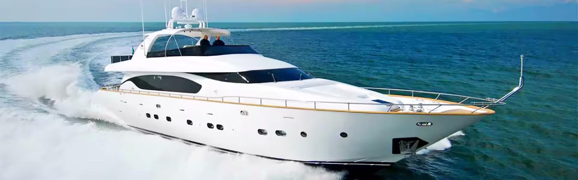 Guests enjoying the Morning Xclusive Superyacht Tour with Xclusive Yacht Tours Dubai, showcasing a luxury yacht against the stunning Dubai skyline.