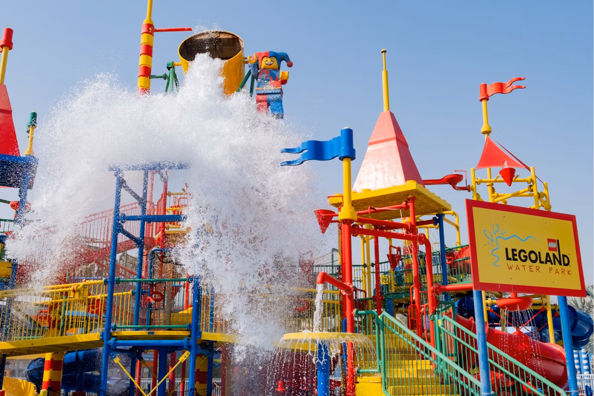 Families enjoying rides at LEGOLAND Water Park with information on LEGOLAND Dubai tickets, timings, and opening hours.