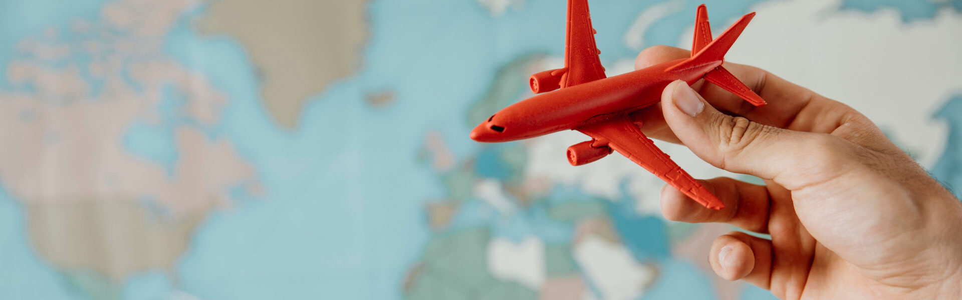 Quick & Easy 30 Days Visa Change – Stay Longer in Dubai › Forever Tourism LLC Happy traveler in Dubai holding passport, representing 30 days visa change with inside country visa extension.